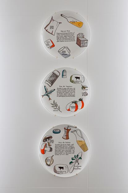 In the kitchen, vintage Fornasetti dishes from the hand-painted pizza line.  