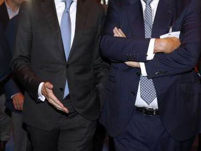 El ministro de Fomento, &Iacute;&ntilde;igo de la Serna y el presidente de Mercadona, Juan Roig, en el acto sobre el Corredor Mediterr&aacute;neo, en Madrid. 