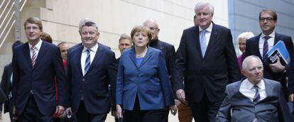 Angela Merkel y los negociadores de la CDU.