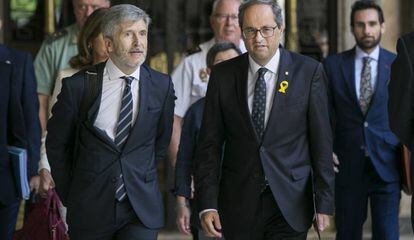 Grande-Marlaska (esq.) i Quim Torra, assisteixen a la Junta de Seguretat de Catalunya en el Palau de la Generalitat