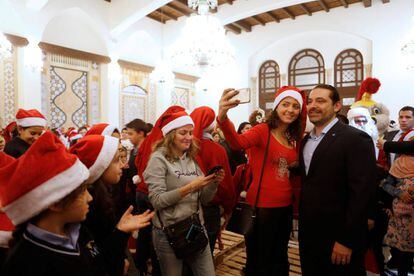 El primer ministro Hariri celebra la navidad con niños huérfanos en Beirut.