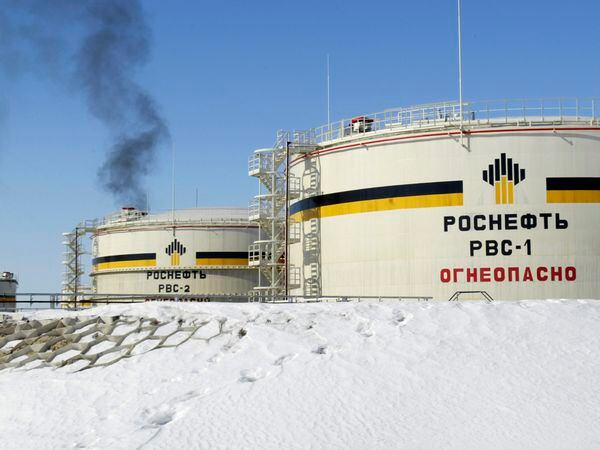 FILE In this file photo taken on Wednesday, April 5, 2006, A view of reservoirs of Russian state-controlled oil giant OAO Rosneft, at Priobskoye oil field near Nefteyugansk, in western Siberia, Russia. Oil prices are plunging after Saudi Arabia started a price war against Russia. The Saudis tried to get the Russians to cut oil production to keep prices from falling even more due to the coronavirus. (AP Photo/Misha Japaridze, File)