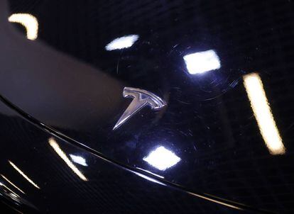 The logo of Tesla carmaker is seen on a car at the Top Marques fair in Monaco