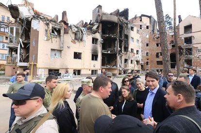 Canada's Prime Minister Justin Trudeau (in blue shirt and jacket) visiting Irpin, outside kyiv, Ukraine, this Sunday.