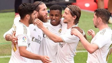 BILBAO, SPAIN - JULY 05: Sergio Ramos of Real Madrid celebrates with teammates after scoring his team's first goal during the La Liga match between Athletic Club and Real Madrid CF at San Mames Stadium on July 05, 2020 in Bilbao, Spain. Football Stadiums around Europe remain empty due to the Coronavirus Pandemic as Government social distancing laws prohibit fans inside venues resulting in all fixtures being played behind closed doors. (Photo by Juan Manuel Serrano Arce/Getty Images)