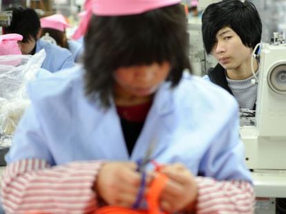 Trabajadores de la f&aacute;brica textil de la empresa Antex, en Hangzhou. 