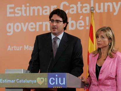 David Madí, en un acto de CiU, con Joana Ortega.