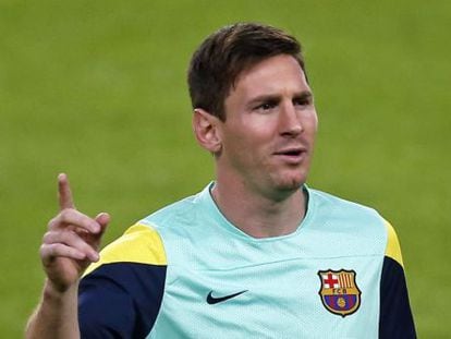 Messi, en un entrenamiento con el Bar&ccedil;a