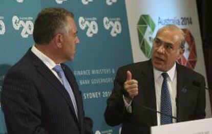 El secretario general de la OCDE, Angel Gurría, y el tesorero federal de Australia, Joe Hockey, ofrecen una rueda de prensa conjunta en la reunión de ministros del G20 en Sídney (Australia) hoy, viernes 21 de febrero de 2014.
