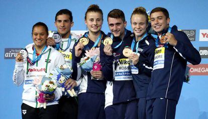 Los ganadores de la competencia mixta desde el trampolín de tres metros