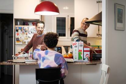 Fran and Luca with their daughter in permanent foster care, prepare dinner at home.