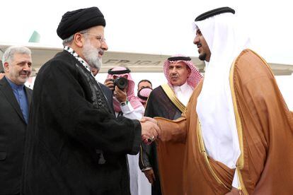 Iran's President Ebrahim Raisi (left) shakes hands with the deputy governor of the Riyadh region, Prince Mohammed bin Abdulrahman bin Aabdulaziz, upon his arrival in Riyadh, Saudi Arabia.  Raisi participates in an emergency meeting of the Organization of Islamic Cooperation (OIC) on Gaza. 