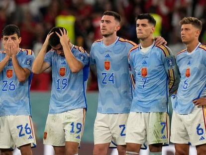 Spain's Pedri, from left, Carlos Soler, Aymeric Laporte, Alvaro Morata and Marcos Llorente react after the penalty shootout at the World Cup round of 16 soccer match between Morocco and Spain, at the Education City Stadium in Al Rayyan, Qatar, Tuesday, Dec. 6, 2022. (AP Photo/Luca Bruno)