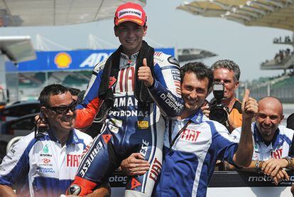 Jorge Lorenzo, tras conseguir la pole en el Gran Premio de Malaisia. El español, más cerca de conseguir su primer mundial de MotoGP.