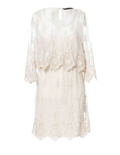 Vestido de aire romántico de Zara. (49,95 euros).