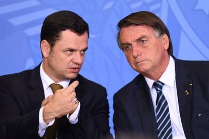Jair Bolsonaro (left) and his Minister of Justice, Anderson Torres, in June 2022.