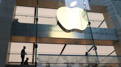 Customers and staff wear protective masks inside an Apple Store in the city centre as the state of New South Wales continues to report low case numbers of the coronavirus disease (COVID-19) in Sydney, Australia, October 26, 2020. REUTERS/Loren Elliott