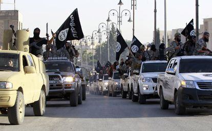 ISIS fighters parade in Raqa (Syria) after the proclamation of the caliphate, in early summer 2014.