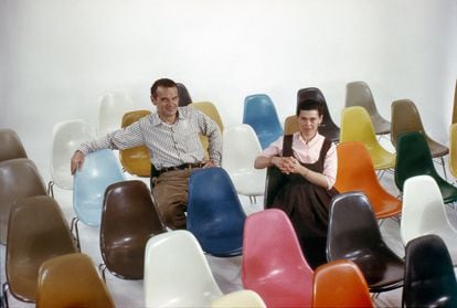 Charles and Ray Eames with the Shell chairs.