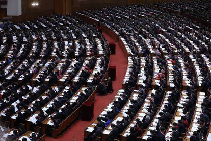 Los delegados participan en la ceremonia inaugural del XIX Congreso Nacional del Partido Comunista de China en el Gran Palacio del Pueblo en Pekín (China), el 18 de octubre de 2017.