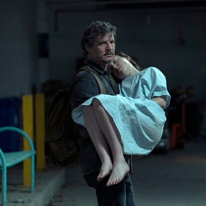 This image released by HBO shows Pedro Pascal, left, and Bella Ramsey in a scene from the series "The Last of Us." (HBO via AP)