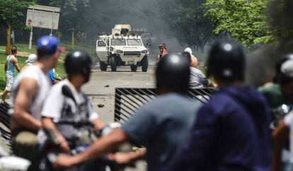 Protestas opositoras, el domingo en la ciudad de Valencia (Venezuela).