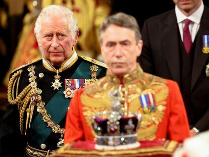 Britain's Prince Charles proceeds behind the Imperial State Crown through the Royal Gallery for the State Opening of Parliament at the Palace of Westminster in London, Britain, May 10, 2022. REUTERS/Hannah McKay/Pool