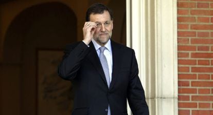 Rajoy, justo antes de reunirse con Rubalcaba.