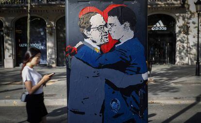 Una pintada sobre el encuentro del presidente de la Generalitat, Quim Torra, y el presidente del Gobierno, Pedro Sánchez.