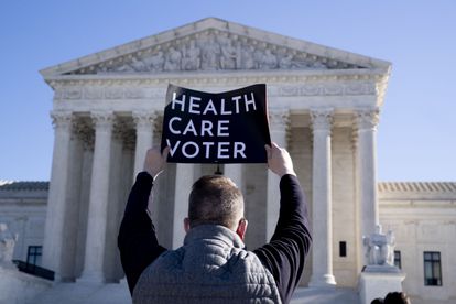 Defenders of Barack Obama's health law demonstrate in front of the Supreme Court, in a file image.