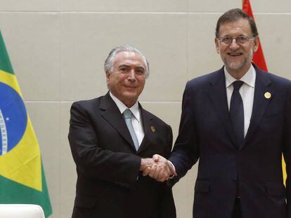 Mariano Rajoy (d), y el presidente brasile&ntilde;o, Michel Temer (i), este jueves en China.