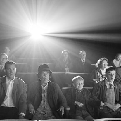 Caitriona Balfe, from left, Jamie Dornan, Judi Dench, Jude Hill and Lewis McAskie appear in a scene from "Belfast." (Rob Youngson/Focus Features via AP)