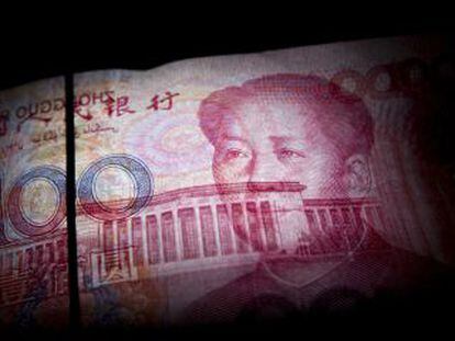 Un billete de 100 yuanes con la efigie de Mao Zedong.