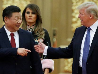 El presidente de EE UU, Donald Trump (a la derecha), y su homólogo chino, Xi Jinping.