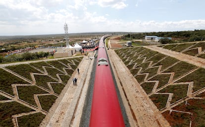 Aerial view of a train on the Standard Gauge Railway in Kimuka.