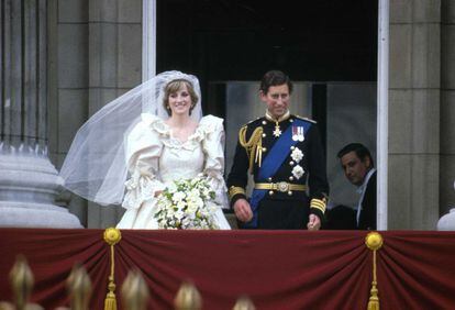 The Princes of Wales, Charles and Diana, waving from Buckingham Palace after their wedding, on July 29, 1981. 
