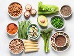 Food sources of plant based protein. Healthy diet with  legumes, dried fruit, seeds, nuts and vegetables.  Foods high in protein, antioxidants, vitamins and fiber. (Food sources of plant based protein. Healthy diet with  legumes, dried fruit, seeds, n