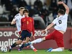 Spain's forward Bryan Gil and Georgia's forward Budu Zivzivadze vie for the ball during the FIFA World Cup Qatar 2022 qualification football match Georgia v Spain in Tbilisi on March 28, 2021. (Photo by Kirill KUDRYAVTSEV / AFP)