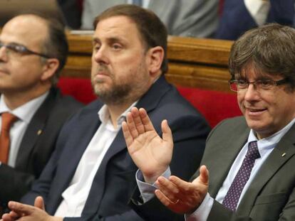 Junqueras y Puigdemont, durante el debate de la ley.