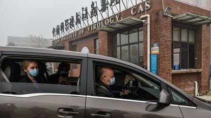 Members of the WHO delegation arrive at the Wuhan Institute of Virology in China on February 3.