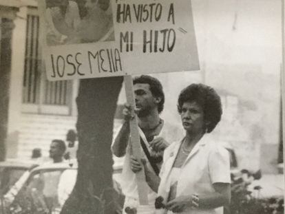 The mother of the disappeared Jose Gabriel Mejia Toro, Eugenia Toro, with another of her sons, Juan Fernando Mejia Toro, at the March of Silence held in Medellin in 1986.