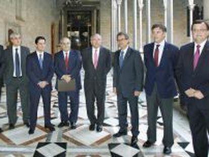 Enrique Ba&ntilde;uelos, Andreu Mas-Colell, Isidre Fain&eacute;, y Artur Mas el d&iacute;a de la presentaci&oacute;n de BCN World.