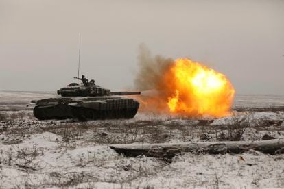 A Russian T-72B3 tank fires its cannon during military exercises at the Kadamovskiy firing range in the Rostov region of southern Russia on January 12.