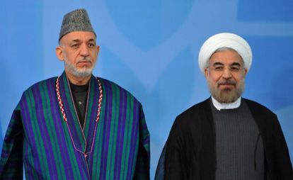 Hamid Karzai, presidente de Afganistán (izquierda) y el presidente de Irán, Hasan Rouhaní.