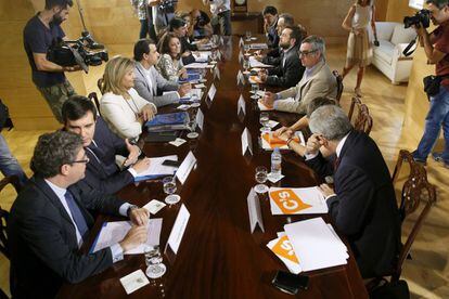 Mesa de negociación PP-Ciudadanos.