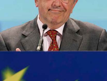 Joaquín Almunia, durante la rueda de prensa, ayer en Bruselas.