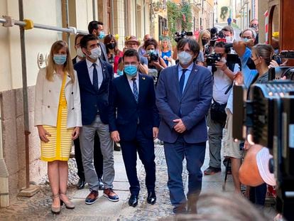 El presidente de la Generalitat, Pere Aragonés y el expresidente Carles Puigdemont, este sábado en el Alguero.