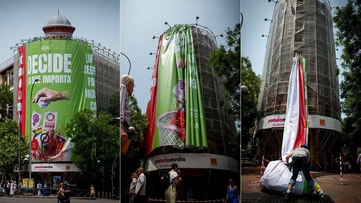 Retirada del cartel de Vox del edificio en la esquina de las calles de  Goya y de Alcalá, en Madrid, el martes 27 de junio.