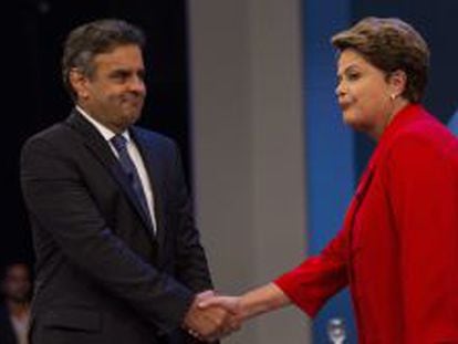 La mandataria y candidata a la Presidencia por el Partido de los Trabajadores (PT), Dilma Rousseff (d), y el opositor del Partido de la Social Democracia Brasile&ntilde;a (PSDB), A&eacute;cio Neves 