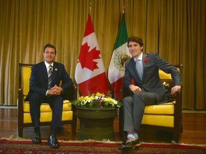 Enrique Peña Nieto y Justin Trudeau en la reunión de Líderes del APEC.
